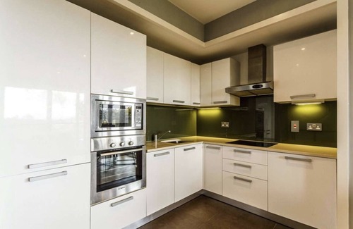 Dublin Apartment | One bedroom with a double bed, bathroom and kitchen with spacious living space.