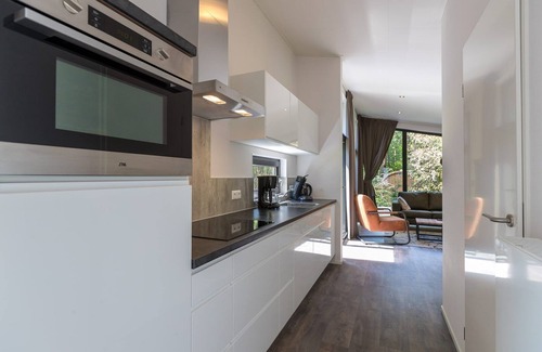 Wekerom House | Optimal enjoyment of nature with the hottub in the yard