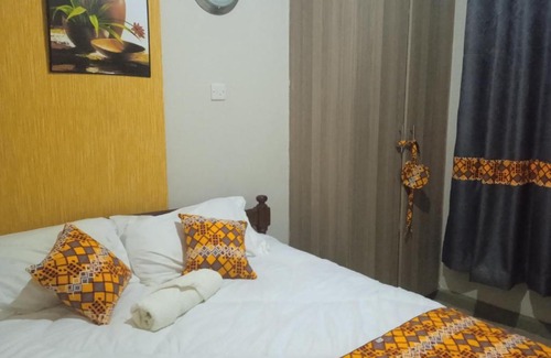 Nairobi Apartment | orange kitenge house