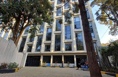 Nairobi Apartment | orange kitenge house