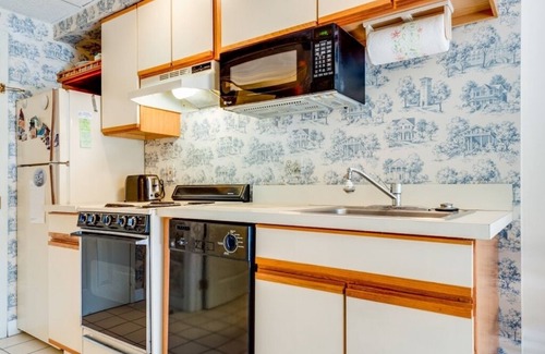 Chautauqua Condo | Originally built in Chautauqua Institution in 1890, the original St. Elmo Hotel building was torn down and rebuilt as a residential condominium. It now offers the convenience of an elevator;