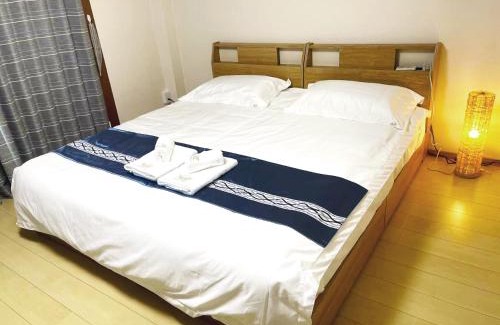 Nagawa Villa | Osaka Castle Park Station, 10 minutes walk to Kyobashi Station, direct access to Shinsaibashi, Umeda, Kansai Airport, Kyoto, Nara, USJ, can accommodate up to 10 people