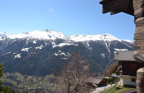Saint-Luc Ski Chalet | Outside : chalet near the center of the village, terrace and balcony with garden furniture, beautifu