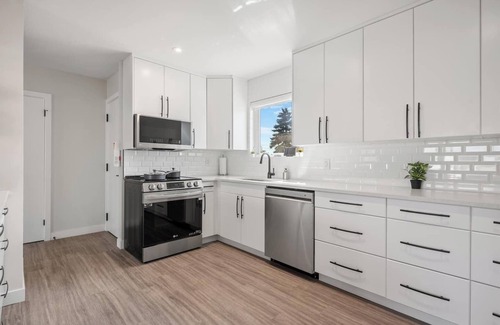 Northeast Edmonton House | Pac-Man fun, pet-friendly comfort, and cozy vibes near Downtown Edmonton