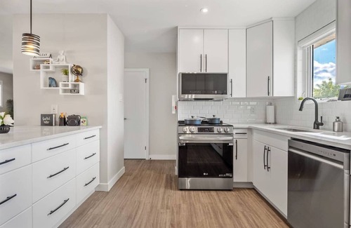 Northeast Edmonton House | Pac-Man fun, pet-friendly comfort, and cozy vibes near Downtown Edmonton