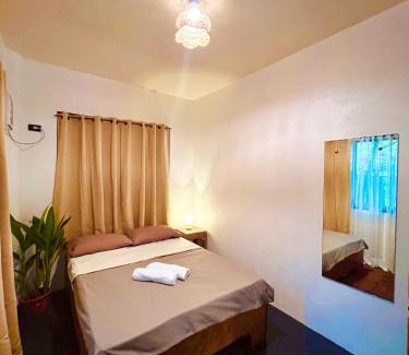 Catangnan Apartment | Paians Home across Cloud 9, General Luna