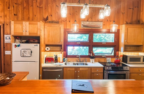 Moultonborough Cottage | Peaceful lake front cottage w/large dock and sandy beach entry