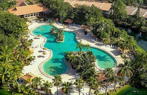 Naples Condo | PEACEFUL LAKE VIEW FROM CONDO Resort style pool NOV DEC & JAN available