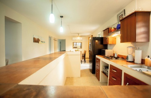 Rio Grande Bed & Breakfast | PELICAN REEF BEACHFRONT 2 BED 1 BATH A/C ON SMALL FARM, SURF RIGHT OUT FRONT