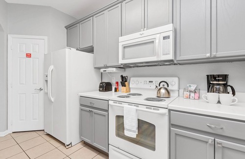 Florida Central Atlantic Coast Condo | Penthouse Condo w/Stunning View of Clubhouse and Lake Cay!