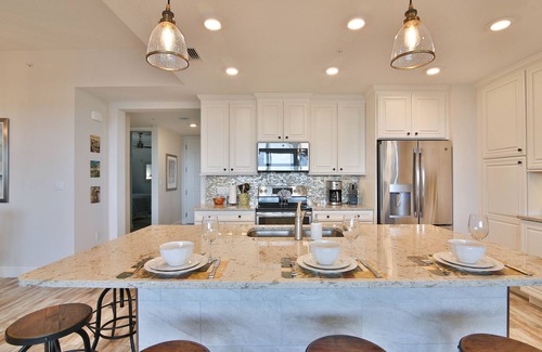 Whitney Beach Condo | PENTHOUSE! Just 2 Min from Anna Maria Island, Heated Pool, Playground, Elevator