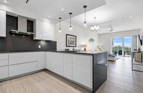 Paradise Island Apartment | Penthouse w/Private Rooftop Terrace | Steps from Renowned Resorts & Golf Courses