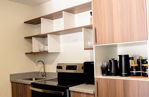 Santa Tecla Condo | Penthouse with Volcano Views & Top Amenities - AC, Gym, Lounge, Patio, Workspace