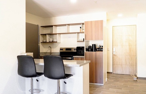 Santa Tecla Condo | Penthouse with Volcano Views & Top Amenities - AC, Gym, Lounge, Patio, Workspace