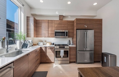 Squire Park House | Perch - Chic retreat near Seattle's heart. Enjoy skyline views, and easy city access.