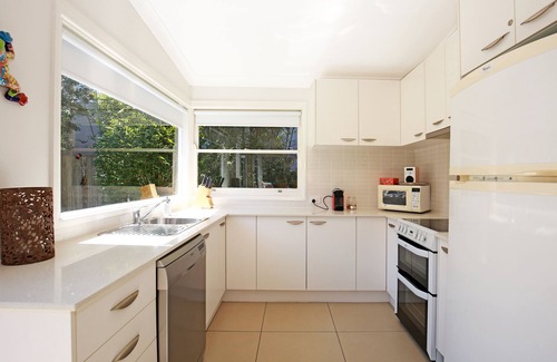 Culburra Beach House | Pet-friendly classic beach house with huge backyard, modern kitchen and bath