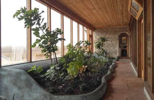 Petaca House | Pet Friendly Earthship in the biggest Off-The-Grid community in the US