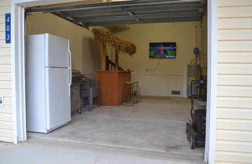 Colington House | Pet Friendly Home with Private Tiki Bar - 3-minute drive to the beach!