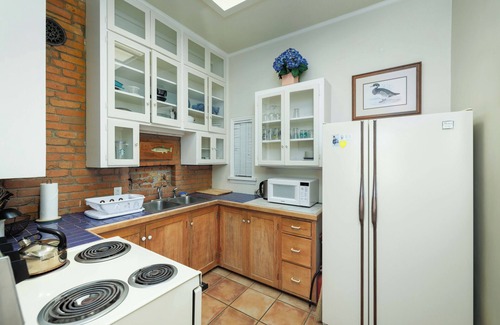 Downtown Bozeman Condo | Pet friendly, historic flat w/great location, AC & fireplace - Fisherman's Flat on Main Street!