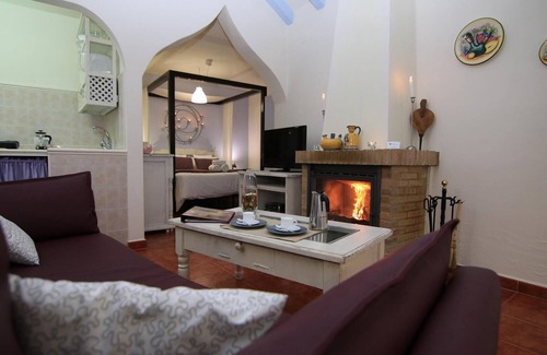 Montecorto Apartment | Pet Friendly Holiday Home 'Romantic paradise 1' with Pool, Garden and Wi-Fi