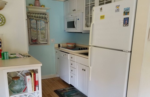 Night Heron Villa | Pet Friendly With Walk to Beach! Private, Quiet Retreat! Access to Pool
