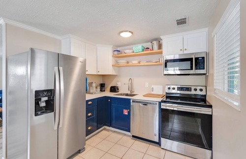 Bid-a-wee Beach House | Pet Friendly Beach Cottage - Walk to the Beach Gated Access - Fenced in Yard - Bidawee