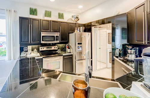 Hunt Club Villa | PgaResortVilla by AmericanVacationLiving 4 BR/3 BA