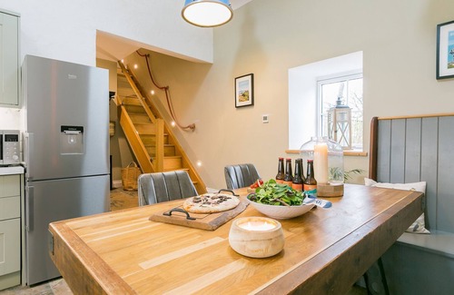 Bryngwran Cottage | Plas Coach House - a hot tub that sleeps 6 guests in 3 bedrooms