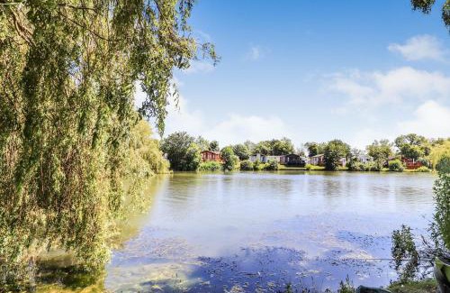 Saxmundham House | Platinum lakeside Lodge on resort with fishing