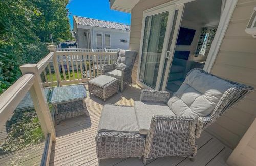 Saxmundham House | Platinum lakeside Lodge on resort with fishing