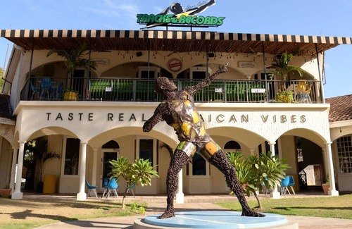 Montego Bay Cottage | Play, Relax, Beach across the street, Hip Strip a few steps away. No car needed.