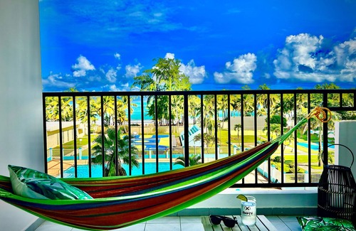 Vilomar Condo | Playa Azul Luquillo Beachfront. Stunning Views!and Near to El Yunque Rainforest