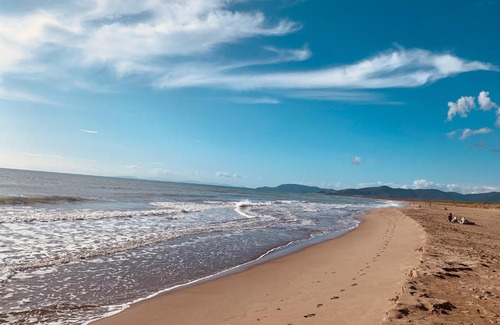 Ravi Apartment | Podere L'Orsinghi in Ravi mit fantastischer Aussicht auf die Hügel der Maremma, Schwimmbad und Garten. Haustiere erlaubt. Kinderfreundlich