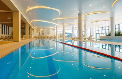 Grzybowo Apartment | POLANKI AQUA Apartamenty NIELIMITOWANY DOSTĘP DO BASENÓW - MIEJSCE POSTOJOWE FREE