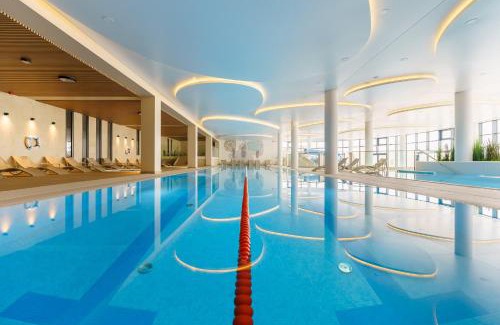 Grzybowo Apartment | POLANKI AQUA Apartamenty NIELIMITOWANY DOSTĘP DO BASENÓW - MIEJSCE POSTOJOWE FREE