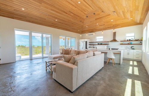 Long Bay Hills House | Ponciana House Ridgetop Sea View with Pool