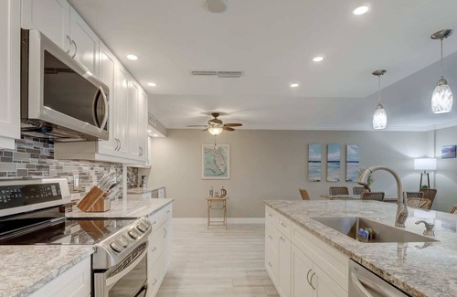Moorings Condo | Pool, Bay and Gulf Views And Walk to the Beach From Our Second Floor Moorings Co