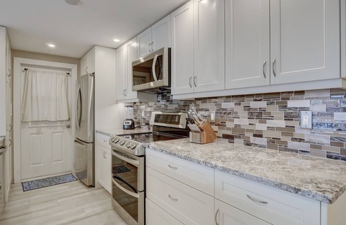 Moorings Condo | Pool, Bay and Gulf Views And Walk to the Beach From Our Second Floor Moorings Co