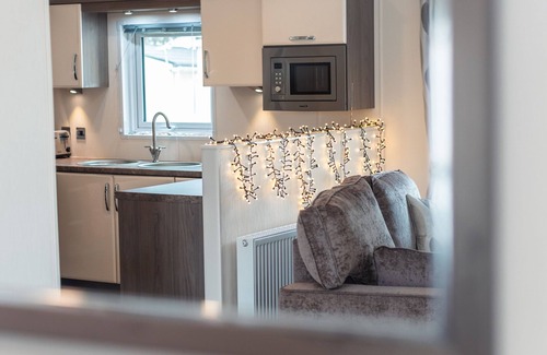 Mudeford House | Pool Lodge - A spacious lodge close to the pool on Sandhills Holiday Park