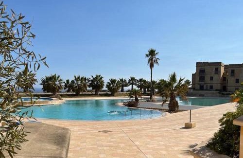 Ghajnsielem Apartment | Poolside Luxury Apartment with Patio 11A3S