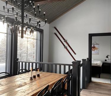 Pyhatunturi Ski Chalet | Porthos Ski-in Lodge with private hot tub and sauna in Lapland