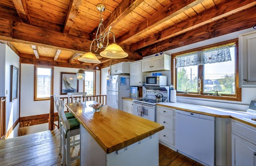 Sandwich House | Post and Beam home with beautiful views of Cape Cod Bay, just one house back from the water