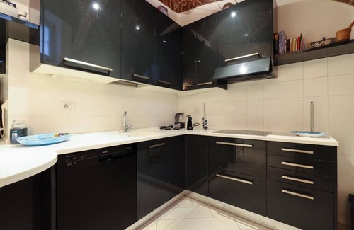 Centro Storico Apartment | Prestigious loft in old Milanese courtyard with large kitchen and ultrafast WiFi