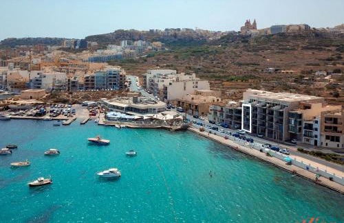 Għadira Apartment | Pretty Beachfront Penthouse in Mellieha