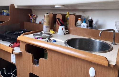 Naturist Village Boat Rental | Pretty sailboat at the quay on the quiet side of the naturist port