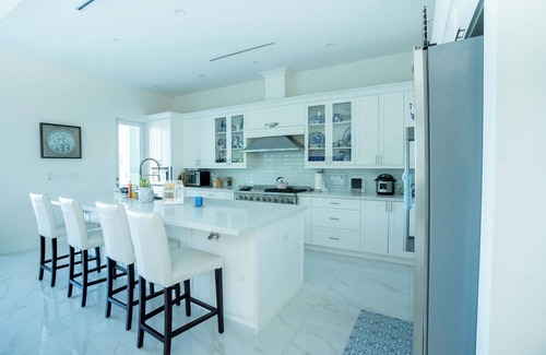 Key Largo House | Private Beach Bayside 6 Bedroom Resort Home with Pool, Dock, & Garage