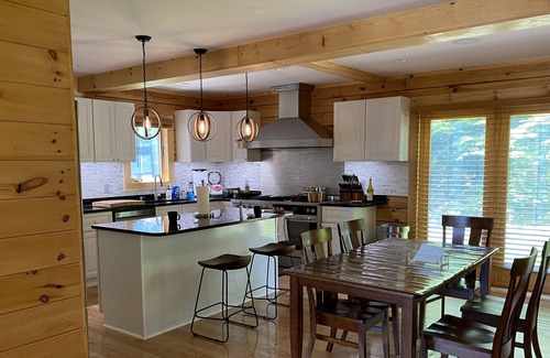 Weare House | Private lakefront new log house Main house