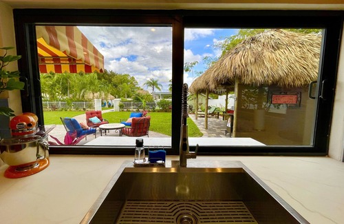 Lake Worth House | Private Resort-Style One Acre Retreat Sleeps 14, Heated Pool, 5BR, Tikis, Golf
