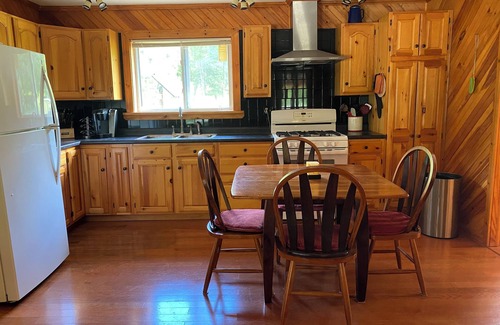 Lawrenceville Cottage | Private & Serene Riverfront Cottage, additional Cabins with a Captivating View!