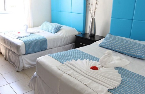 Corozal Villa | Private Villas in Palma Real Two rooms